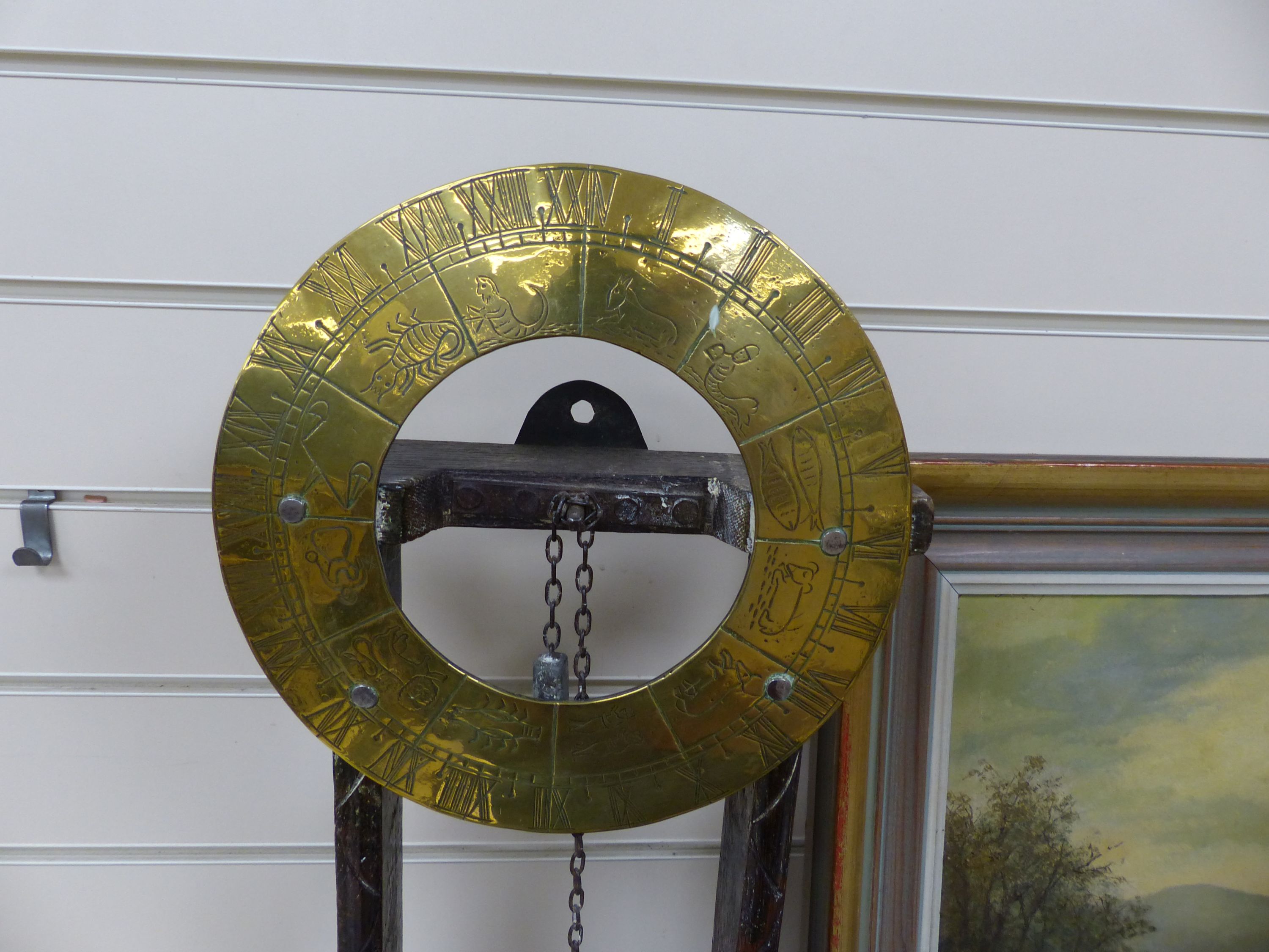 A 17th century style oak and brass 'Clepsydra' or water clock